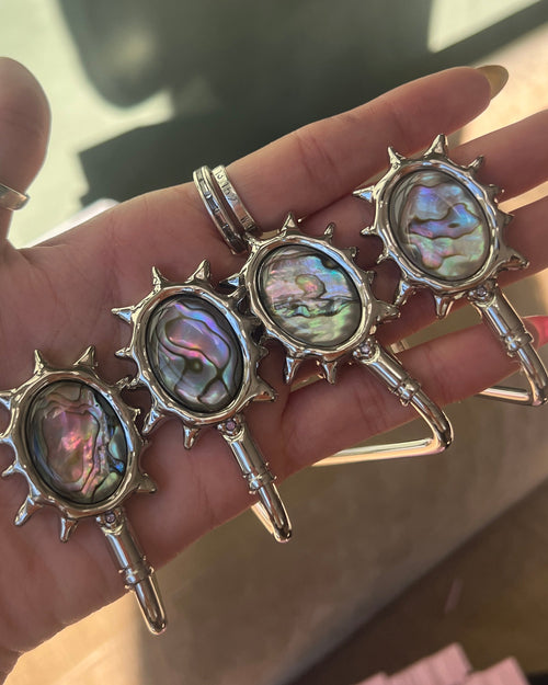 Four abalone shell purse hooks / bag hangers
